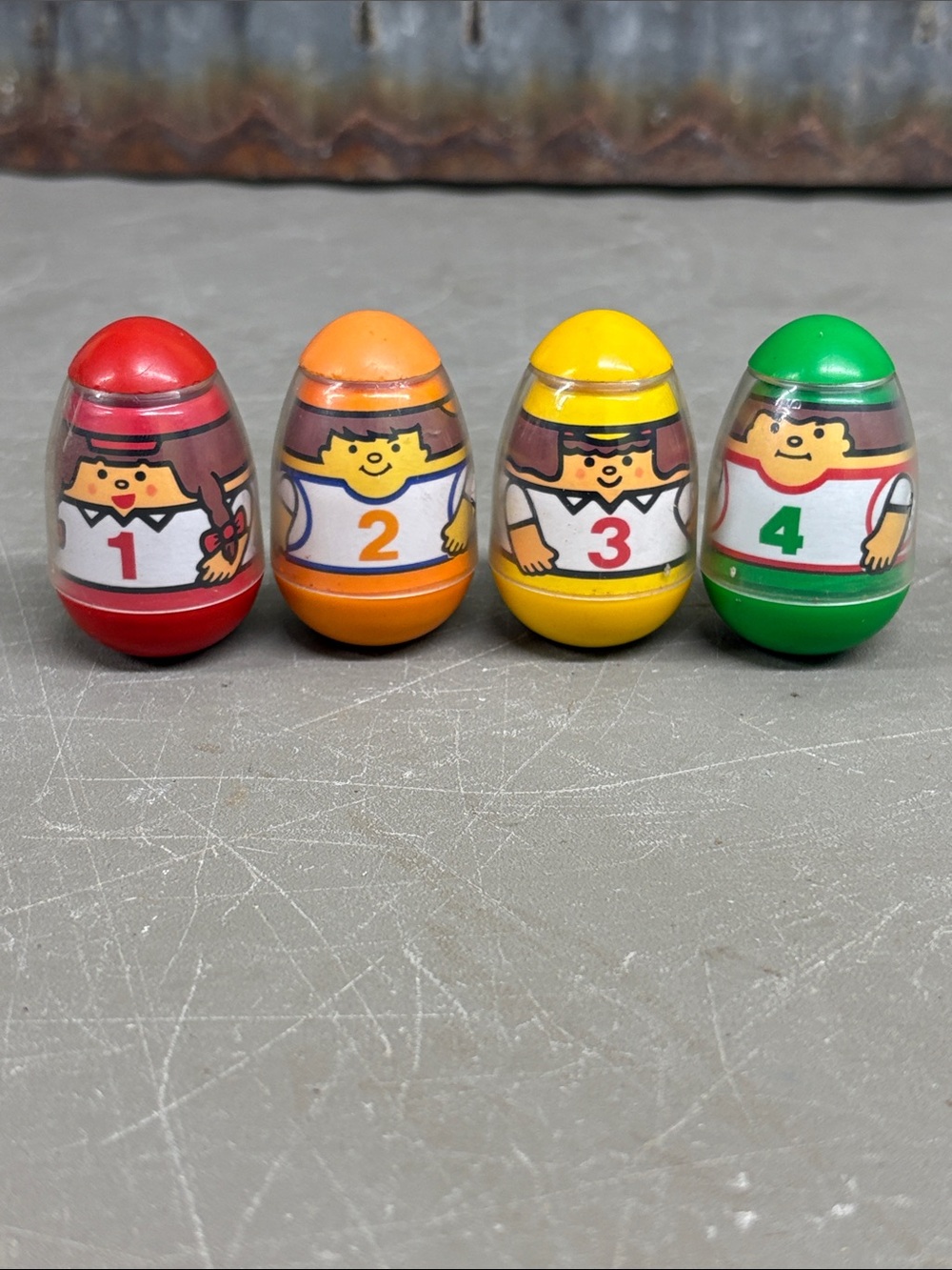 1970s Hasbro Weebles numbered racer figures from the Weebles Wobble Race Track